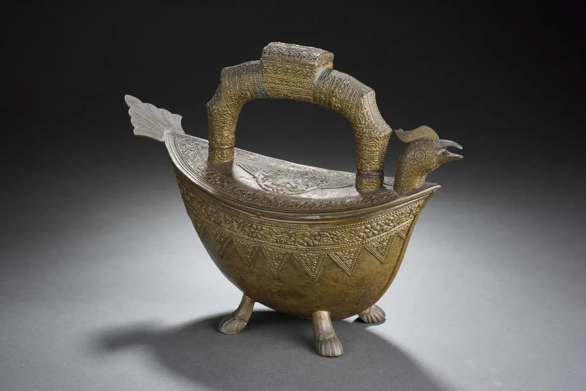 Brass ewer with a bird-shaped spout and animal-shaped feet, West Sumatra, early 20th century
